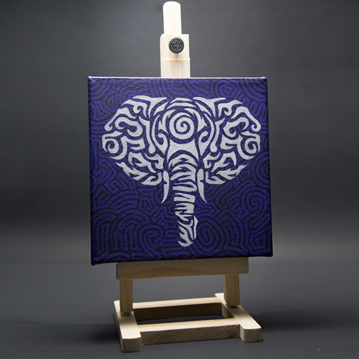 Photo of elephant painting on easel